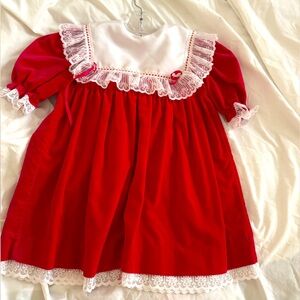 Red velvet with white lace trimmed collar little girls party dress.